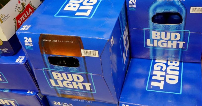 Cases of Bud Light, made by Anheuser-Busch, sit on a store shelf in Miami.