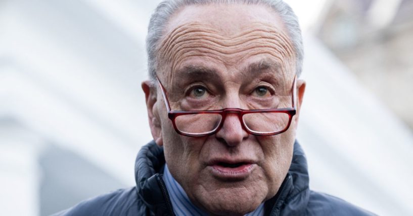 Senate Majority Leader Chuck Schumer speaks to reporters following a meeting with President Joe Biden about government funding outside the White House in Washington, D.C., on Jan. 17.