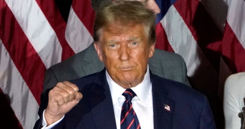 Republican presidential candidate and former President Donald Trump gestures during an election night party in Nashua, New Hampshire, on Tuesday.