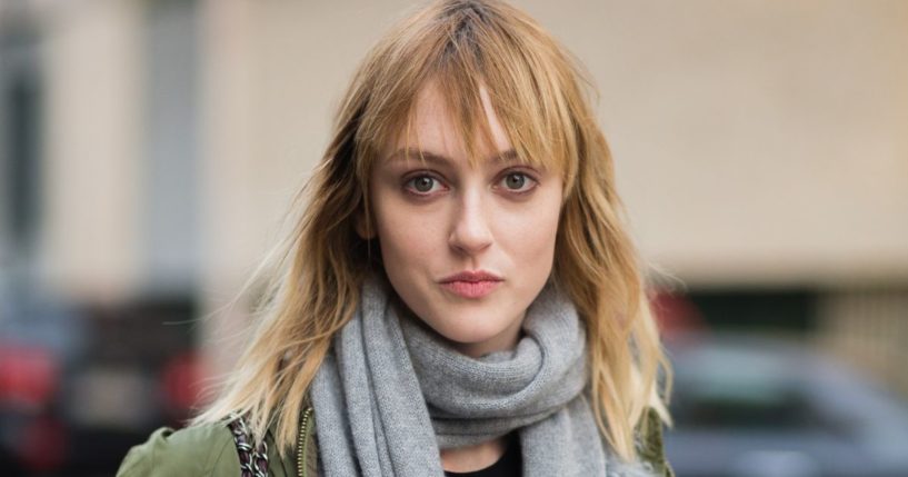 Model Frances Coombe exits the Marco De Vincenzo show in Milan, Italy, on Feb. 27, 2015.