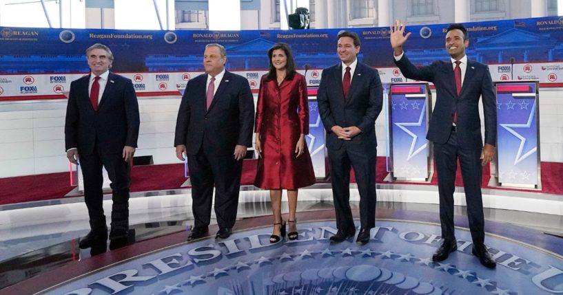 North Dakota Gov. Doug Burgum, left, stands with other Republican presidential candidates during a GOP primary debate at the Ronald Reagan Presidential Library in Simi Valley, California, on Sept. 27.