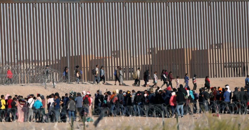 Illegal immigrants wait to be processed by the U.S. Border Patrol after having crossed the Rio Grande River from Ciudad Juarez, Mexico, on Dec. 5.