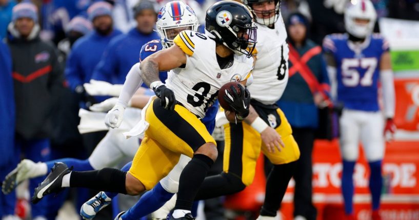 Jaylen Warren of the Pittsburgh Steelers carries the ball against the Buffalo Bills during a wild-card playoff game in Orchard Park, New York, on Monday.