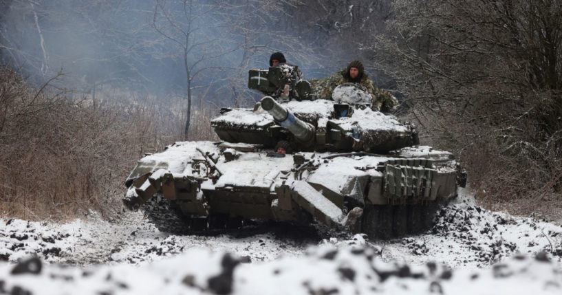 Ukrainian soldiers rive a tank in a position near to the town of Bakhmut, Ukraine, amid the Russian invasion of Ukraine on Dec. 13.