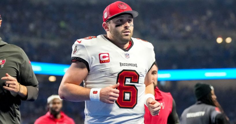 Tampa Bay Buccaneers quarterback Baker Mayfield runs off the field during the game against the Detroit Lions in Detroit, Michigan, on Jan. 21.