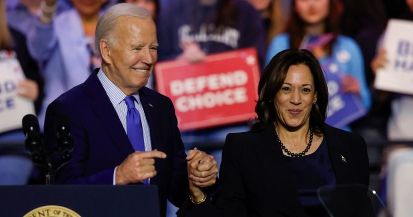 President Joe Biden, left, and Vice President Kamala Harris, right, stand onstage and wave to the crowd at a ”Reproductive Freedom Campaign Rally" in Manassas, Virginia, on Jan. 23.