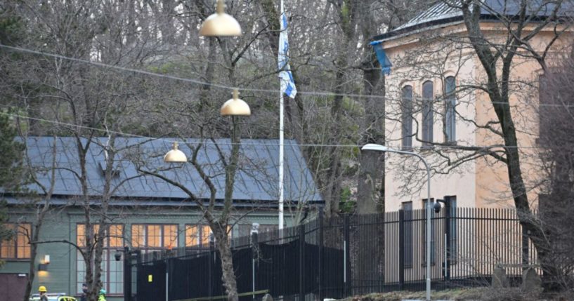 A police car is seen outside the Israeli embassy Wednesday in Stockholm.