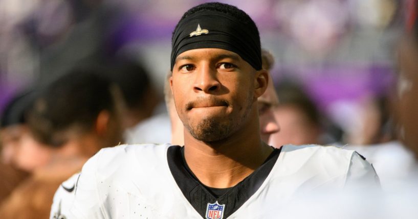 New Orleans Saints quarterback Jameis Winston greets teammates before the game against the Minnesota Vikings in Minneapolis, Minnesota, on Nov. 12.