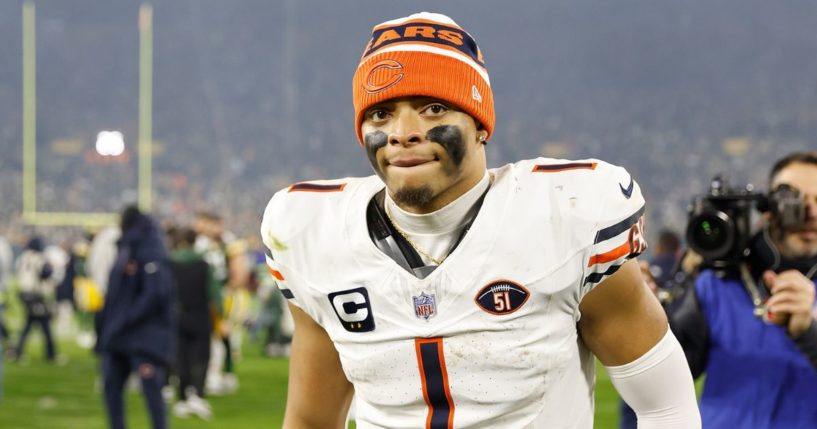 Justin Fields of the Chicago Bears looks on after his team's 17-9 loss to the Green Bay Packers at Lambeau Field on Jan. 7.