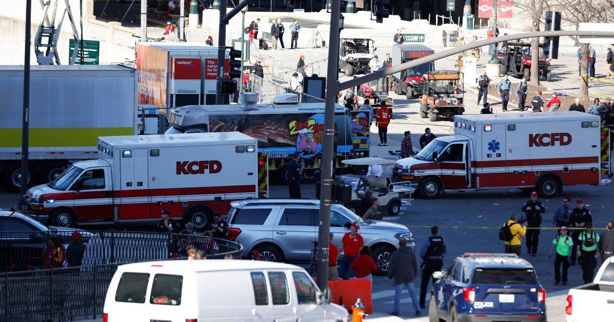 Law enforcement and medical personnel respond to a shooting at Union Station during the Kansas City Chiefs' Super Bowl victory parade in Kansas City on Wednesday.