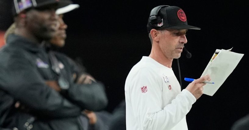 San Francisco 49ers head coach Kyle Shanahan looks at notes during the second half of the Super Bowl against the Kansas City Chiefs on Sunday in Las Vegas.