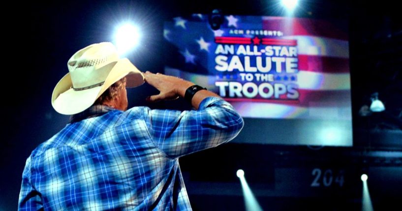 Toby Keith saluting the troops at ACM Presents: An All-Star Salute To The Troops at the MGM Garden Arena in 2014.