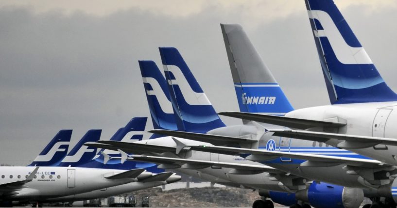 Passenger planes of the Finnish national airline carrier, Finnair, sit on the tarmac at Helsinki Airport in 2009.