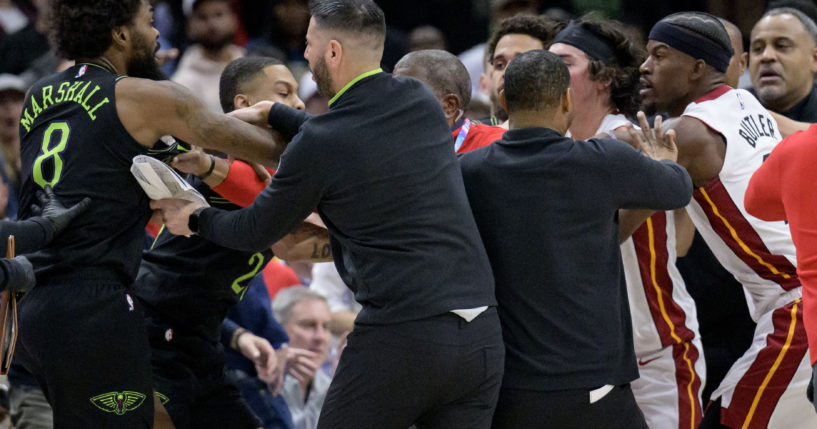 Miami's Jimmy Butler, far right, and New Orleans' Naji Marshall, far left, get involved in a scuffle during the fourth quarter of an NBA game in New Orleans on Friday night.