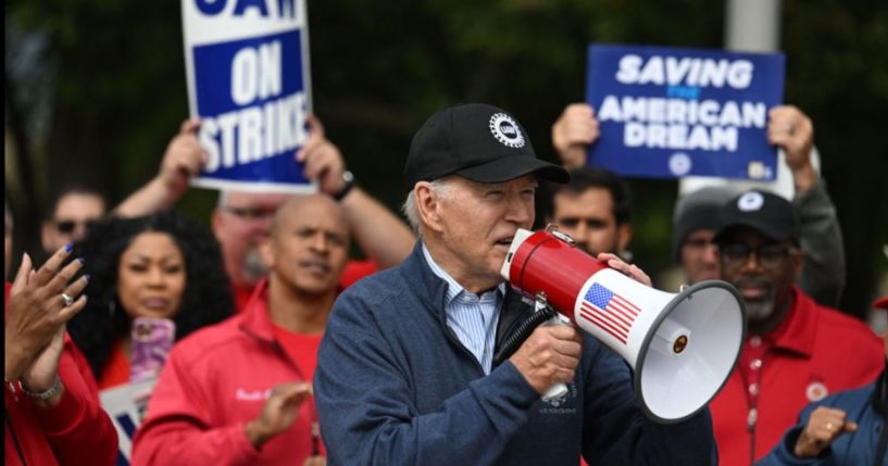 President Joe Biden, seen in a file photo from September, is fond of loudly blowing his horn about new jobs figures, but recently revised figures tell a much different story.