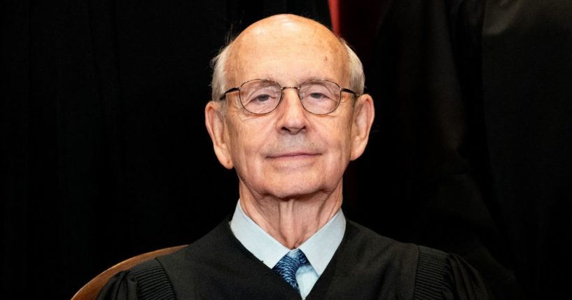 Then-Associate Justice Stephen Breyer sits during a group photo of the justices at the Supreme Court in Washington on April 23, 2021.