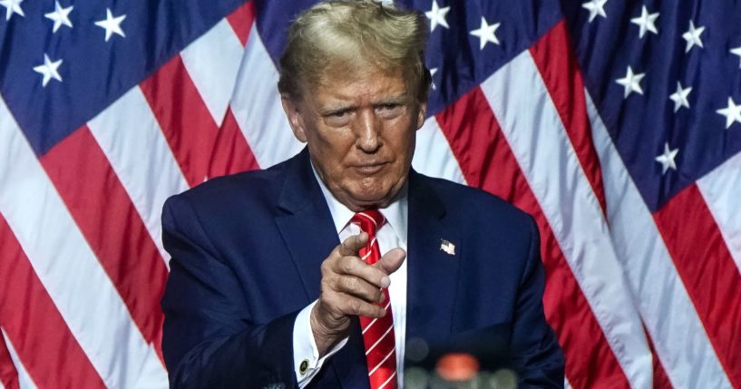 Former President Donald Trump gestures to the crowd after speaking at a campaign event in Rome, Georgia, on March 9.