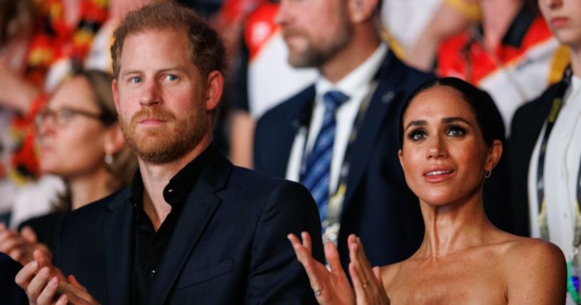 Prince Harry, left, and Meghan, Duchess of Sussex, right, are seen during the closing ceremony of the Invictus Games Düsseldorf 2023 in Düsseldorf, Germany, on Sept. 16.