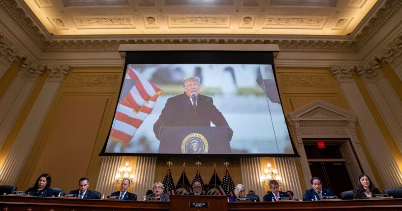 Former U.S. President Donald Trump is displayed on a screen during a meeting of the Select Committee to Investigate the January 6th Attack on the U.S. Capitol in the Canon House Office Building on Capitol Hill in Washington, D.C., on Dec. 19, 2022.