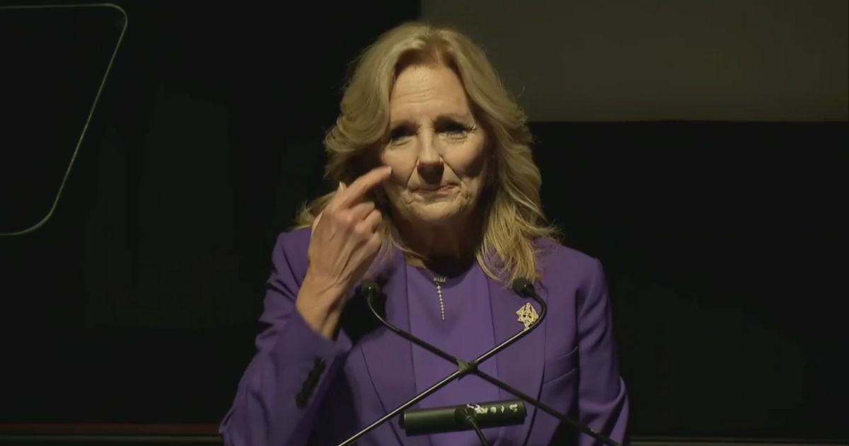 Jill Biden being interrupted during a campaign speech