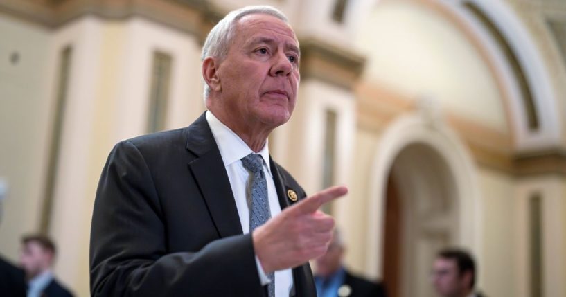 Ken Buck walking out of the House chamber