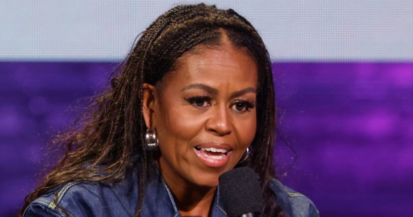 Former first lady Michelle Obama speaks onstage during at the Warner Theatre in Washington on Nov. 15, 2022.