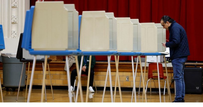 Voters cast their ballots at a polling location during the Michigan presidential primary in Dearborn, Michigan, on Feb. 27.