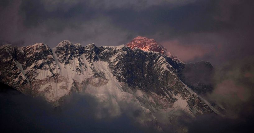 the last light of the day setting on Mount Everest