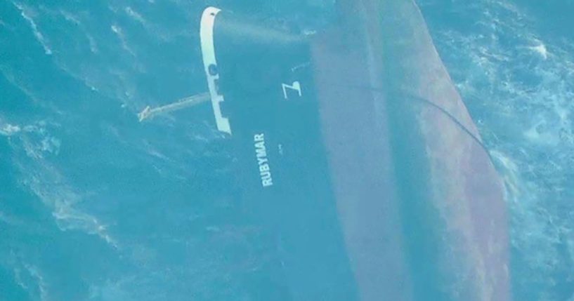 This undated photo released Sunday by the U.S. military's Central Command shows the Belize-flagged vessel Rubymar sinking in the Red Sea.