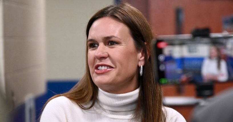 Arkansas Gov. Sarah Huckabee Sanders speaks with reporters after casting her vote on Super Tuesday at the Dunbar Recreation Center in Little Rock on March 5.