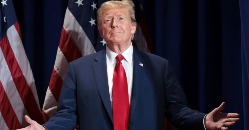 Republican presidential candidate and former President Donald Trump reacts to supporters as he arrives on stage during a Get Out the Vote Rally, Saturday, in Richmond, Virginia.