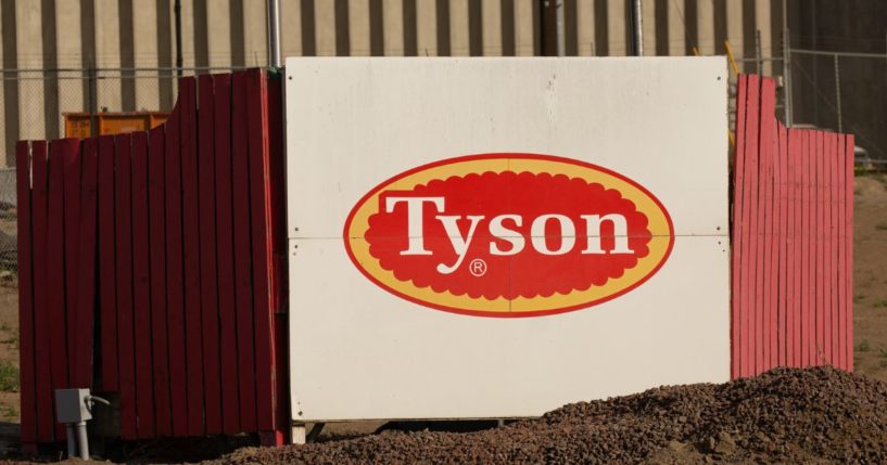 A sign at the entrance to a Tyson Fresh Meats plant in Wallula, Washington in a file photo from 2020. The company is under fire for laying off 1,000 workers in Iowa while hiring thousands of illegal immigrants elsewhere.