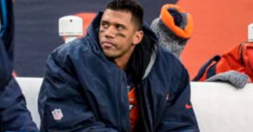 Denver Broncos quarterback Russell Wilson, pictured on the bench during a Dec. 31 game against the Los Angeles Chargers.