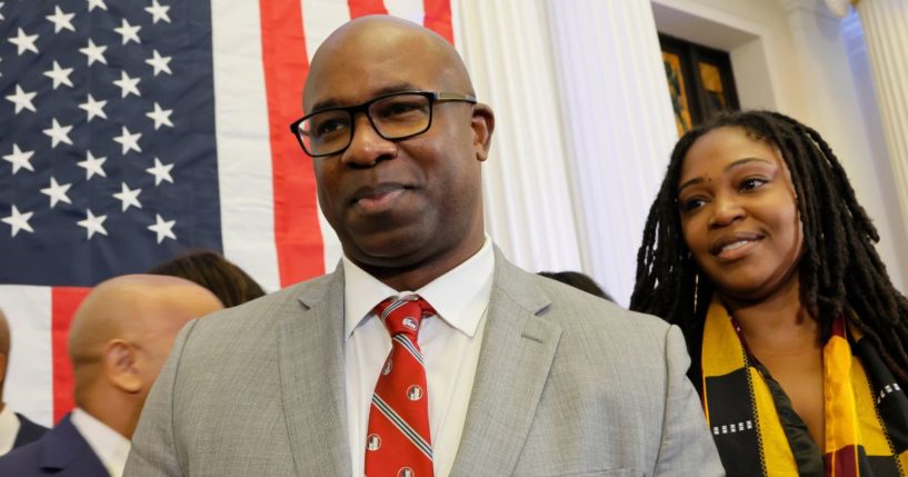 Democratic Rep. Jamaal Bowman watches as New York Gov. Kathy Hochul greets people after signing legislation creating a commission for the study of reparations in New York on Dec. 19.