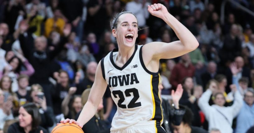 Caitlin Clark, of the Iowa Hawkeyes, celebrates after beating the LSU Tigers 94-87 in the Elite 8 round of the NCAA Women's Basketball Tournament at MVP Arena Monday in Albany, New York.