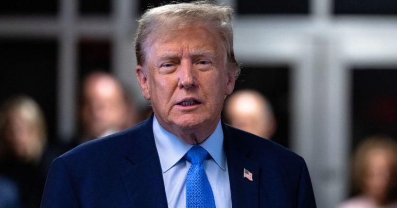 Former President Donald Trump speaks to members of the media during his hush money trial at Manhattan criminal court in New York City on Friday.