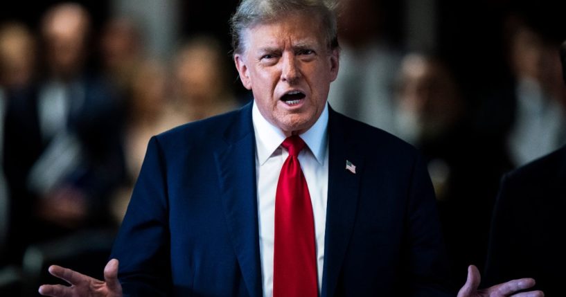 Former President Donald Trump arrives ahead of the start of jury selection at Manhattan Criminal Court in New York City on Monday.