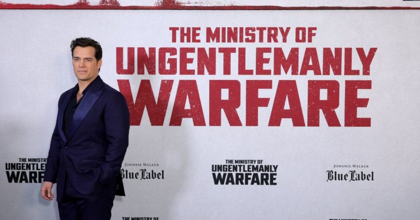 Actor Henry Cavill posing for pictures at the New York Premiere for "The Ministry of Ungentlemanly Warfare."