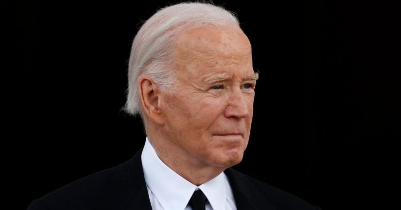 President Joe Biden waits to welcome Japanese Prime Minister Fumio Kishida and his wife Yuko Kishida to the White House in Washington, D.C., on Wednesday.