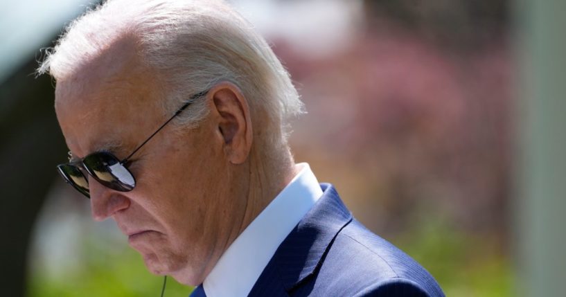 Joe Biden listening during a news conference