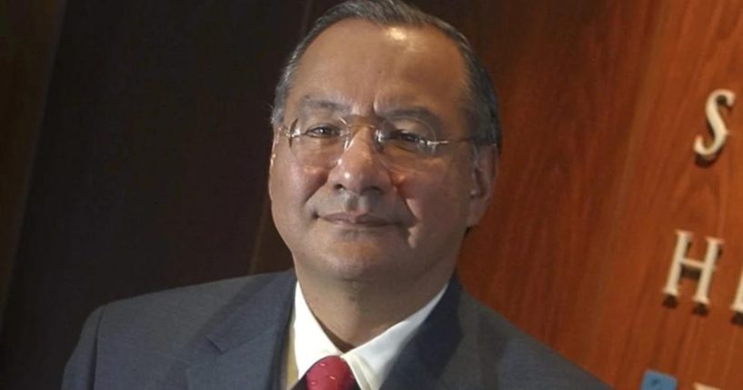 Victor Manuel Rocha poses for a portrait at Steel Hector & Davis in Miami in January 2003, joining the law firm to help open doors in Latin America. Rocha was sentenced Friday to 15 years in federal prison.