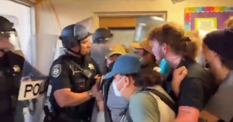 police confronting protesters at Cal Poly Humboldt