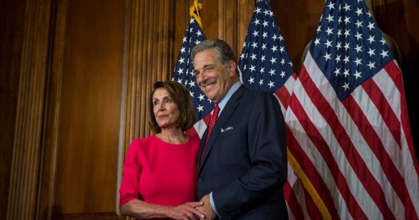 House Speaker Nancy Pelosi posing for pictures with her husband, Paul Pelosi, on Capitol Hill in 2019.