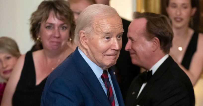 Joe greeting visitors at a state dinner at the White House