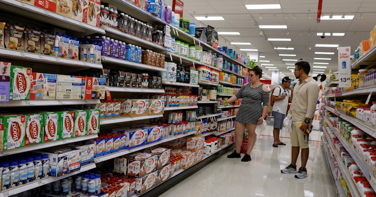 Customers shop at a Target store in Miami on May 20.