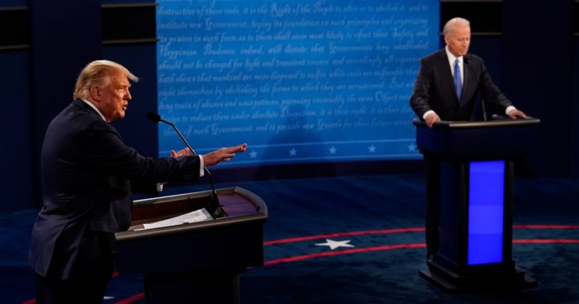 Now-former President Donald Trump answers a question on Oct. 22, 2020, as President Joe Biden listens during the presidential debate at Belmont University in Nashville, Tennessee. Trump and Biden will debate twice this year.