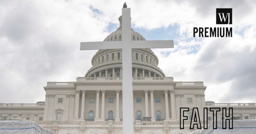 Members of the Christian Defense Coalition set up a 15-foot tall cross before the start of an outdoor Good Friday service on the grounds of the U.S. Capitol in Washington, D.C., on April 10, 2020.