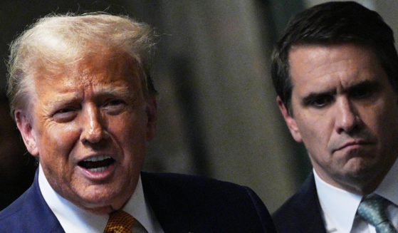 Former US President Donald Trump, with attorney Todd Blanche, speaks to the media at his trial for allegedly covering up hush money payments linked to an extramarital affair with Stormy Daniels, at Manhattan Criminal Court on May 14, 2024 in New York City.