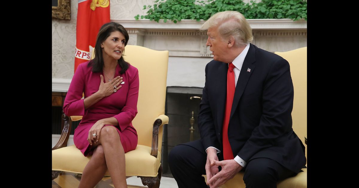 Then-U.S. President Donald Trump announces that he has accepted the resignation of Nikki Haley as US Ambassador to the United Nations, in the Oval Office on October 9, 2018 in Washington, DC.