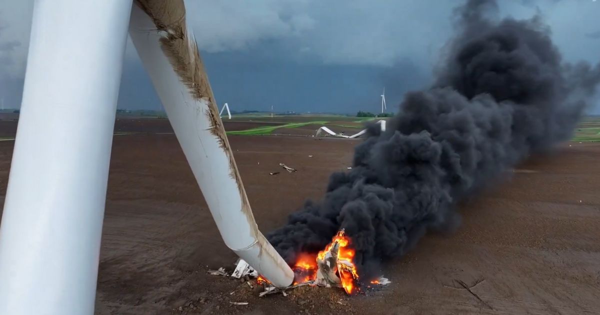 A fallen wind turbine is on fire in Iowa.
